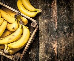 box of fresh bananas. photo