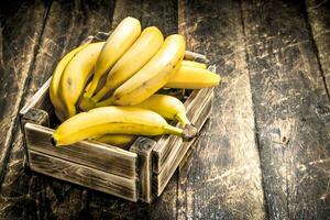 box of fresh bananas. photo