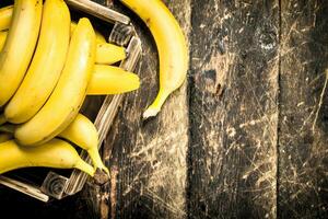 box of fresh bananas. photo