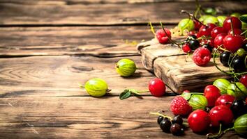 Forest berries on the Board. photo