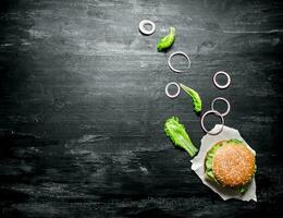 Fresh Burger with onions and herbs.  Top view. photo