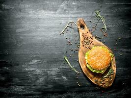 hamburger on a wooden Board.  Top view. photo