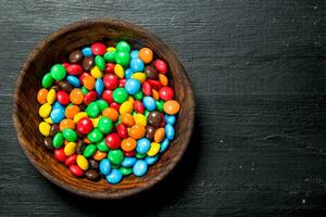 Different baby sweets in bowls. photo