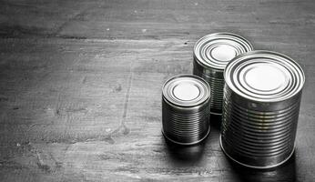 Tin cans with food. photo