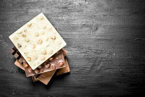 diferente tipos de chocolate en barras. foto