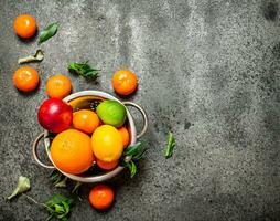 Fresh citrus fruit in a bowl. photo