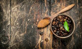 Coffee beans in a bowl. photo