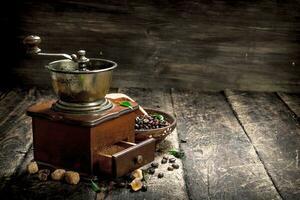 Coffee grinder with coffee beans. photo