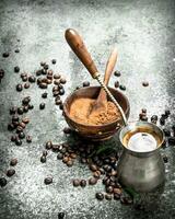 Coffee background. Fresh coffee in turk. photo