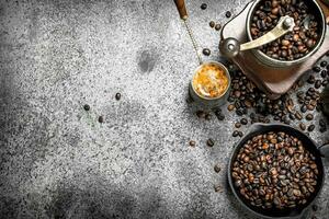 Coffee background. Fresh coffee in turk. photo