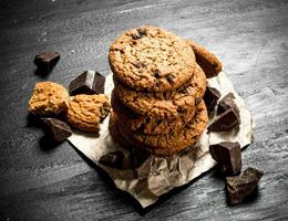 Oatmeal cookies in with chocolate. photo