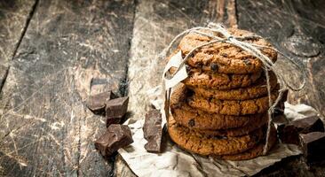 Oatmeal cookies with chocolate. photo