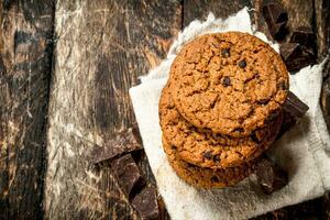 Oatmeal cookies with chocolate. photo