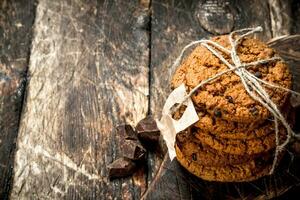 Oatmeal cookies with chocolate. photo