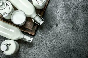 fresh milk. On rustic background. photo