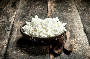 Cottage cheese from fresh cow milk. photo
