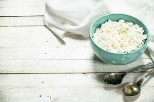 Cottage cheese from fresh milk in a bowl. photo