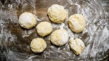 Preparation of the dough. The prepared dough with flour. photo