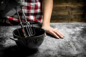 Dough background. A woman is preparing a fresh dough. photo