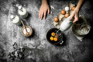 Dough background. A woman is preparing a fresh dough. photo