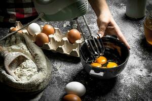 Dough background. Preparation of the dough from fresh ingredients. photo