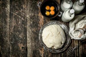 Fresh dough with ingredients. photo