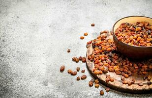 Raisins in a bowl. photo