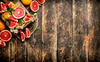 Fresh grapefruit in an old box. photo