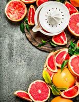 Freshly squeezed grapefruit juice with fruit pieces. photo