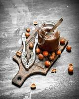 Chocolate butter with hazelnuts. photo