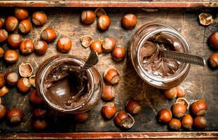 Chocolate butter with hazelnuts. photo