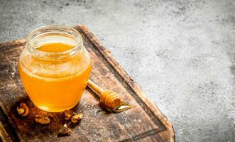 Fresh honey with nuts. photo