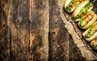 Street food. hot Dogs with herbs, vegetables and hot mustard. photo