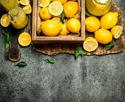 Fresh lemonade from ripe lemons in the box. photo
