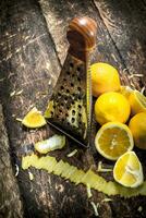 Fresh lemons with a grater. photo