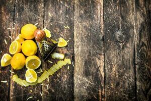 Fresh lemons with a grater. photo