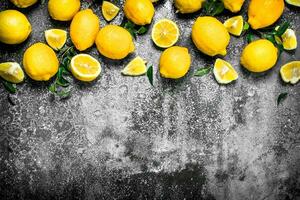 Fresh lemons with leaves. photo