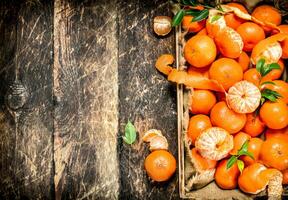 Fresh tangerines on a tray. photo