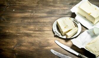 Butter with knife. photo