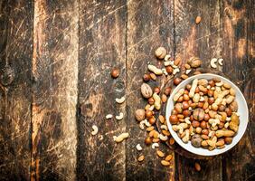 Different nuts in a bowl. photo