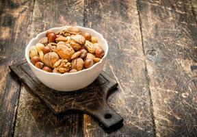 Different nuts in a bowl. photo