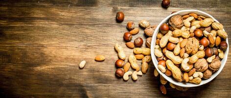 Different nuts in a bowl. photo