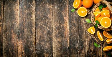 Ripe oranges in the basket. photo