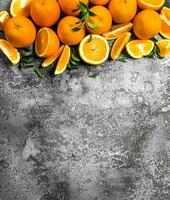Fresh oranges with leaves. photo