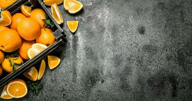 Fresh oranges in a box. photo