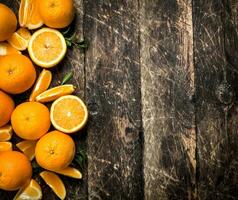 Fresh oranges with leaves. photo