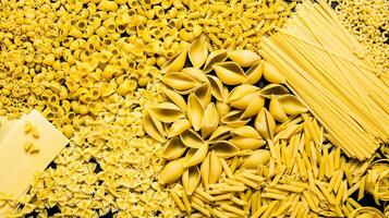 Pasta background . Mixed dried pasta . photo