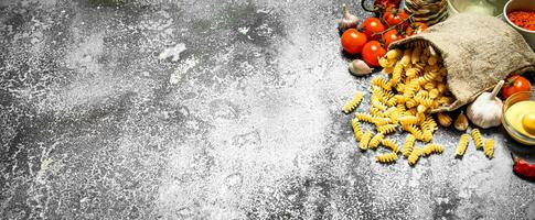 Pasta in bag with vegetables. photo