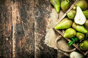 Fresh pears on an old tray. photo