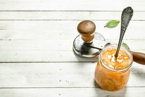 Marinated cabbage in glass jar. photo